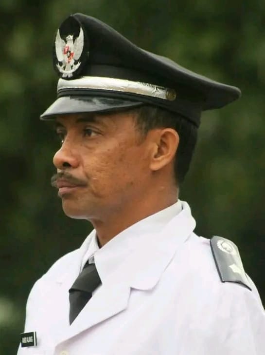 Andi Alang, S.Pd